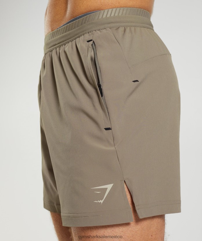 Gymshark pantalones cortos híbridos apex 5 marrón terroso hombres 04BZTL550 - Gymshark Hombre