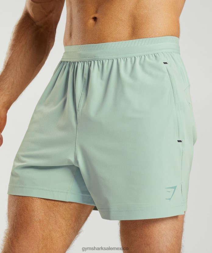 Gymshark pantalones cortos híbridos apex 5 verde azulado helado hombres 04BZTL549 - Gymshark México