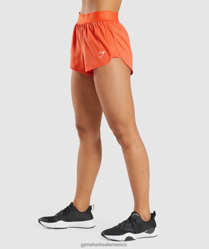 Gymshark pantalones cortos de entrenamiento holgados naranja papaya mujer 04BZTL80 - Gymshark México