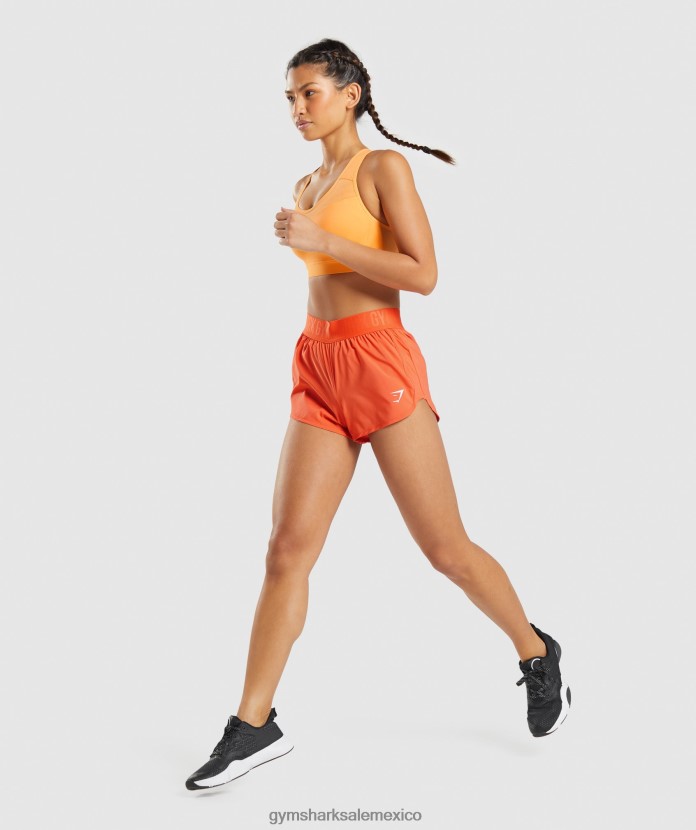 Gymshark pantalones cortos de entrenamiento holgados naranja papaya mujer 04BZTL80 - Gymshark México
