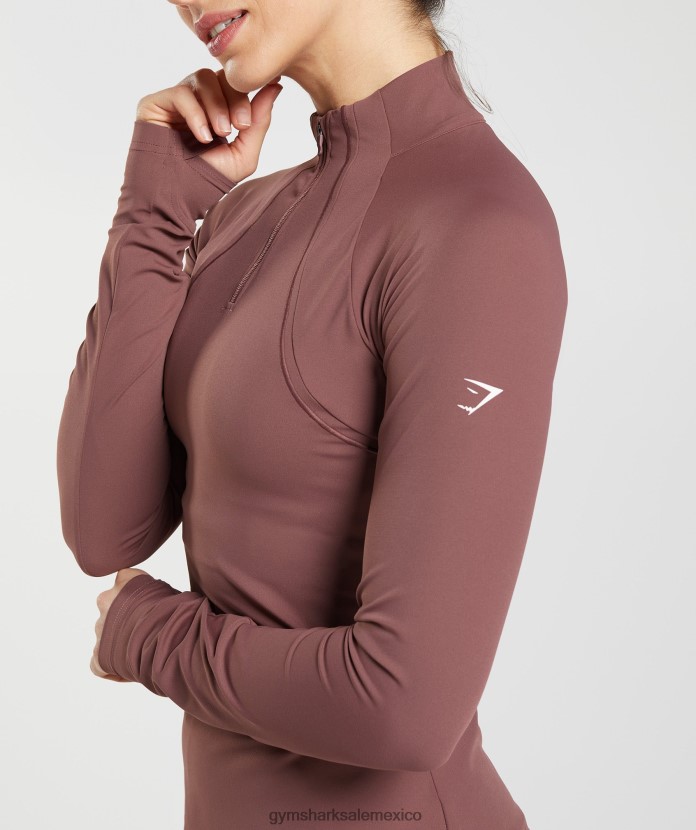 Gymshark corriendo 1/4 zip marrón magenta mujer 04BZTL359 - Gymshark Mexico